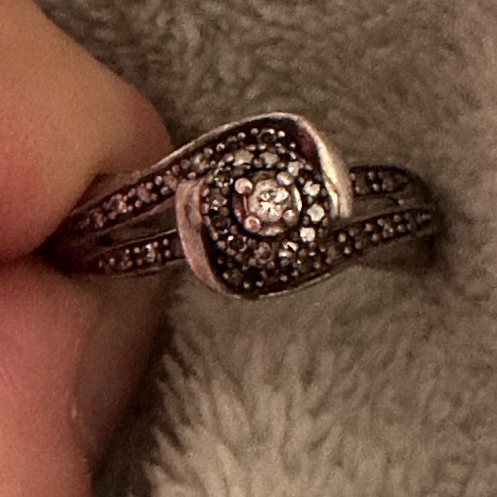 Elegant Silver Ring with Diamond Accents